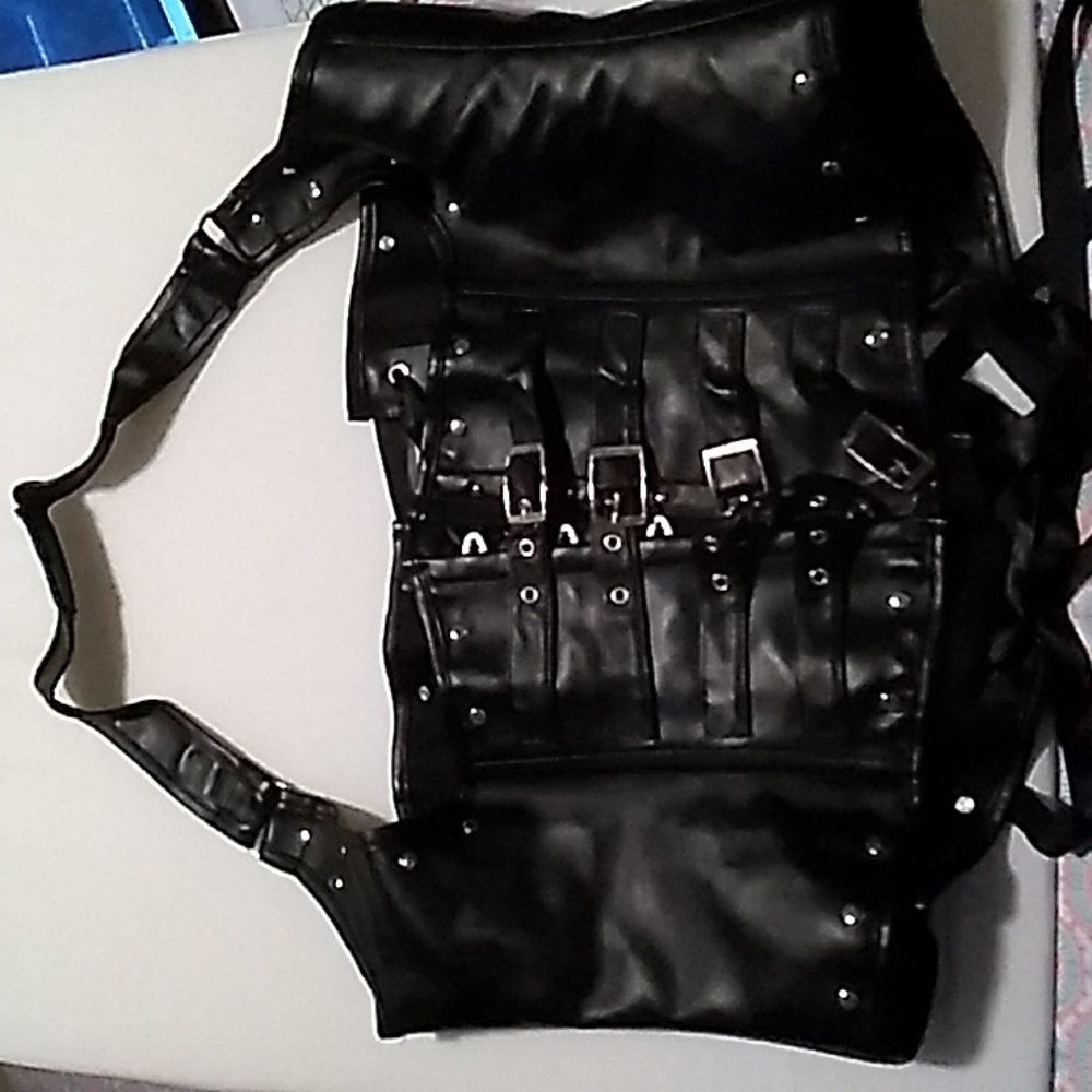 Corset story black pleather corset. UK24